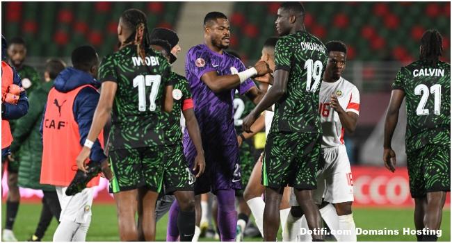 Nigeria players celebrate their victory after the Africa Cup of Nations (CAN) round of 16 football match between Nigeria and Mozambique