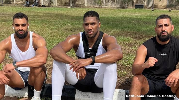 Anthony Joshua attends burial of close friend and coach Sina Ghami in London